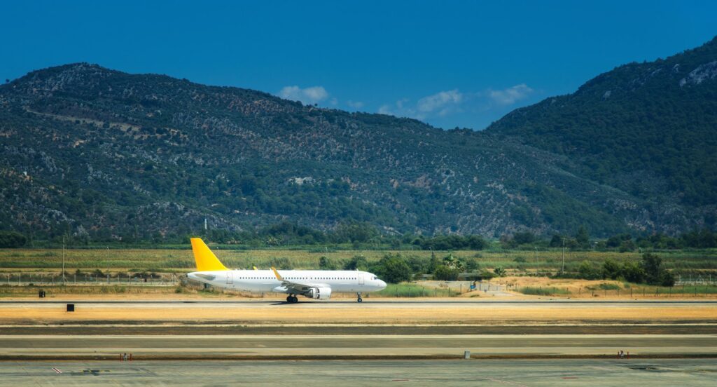 Beautiful white airplane on the runway in Dalaman airport