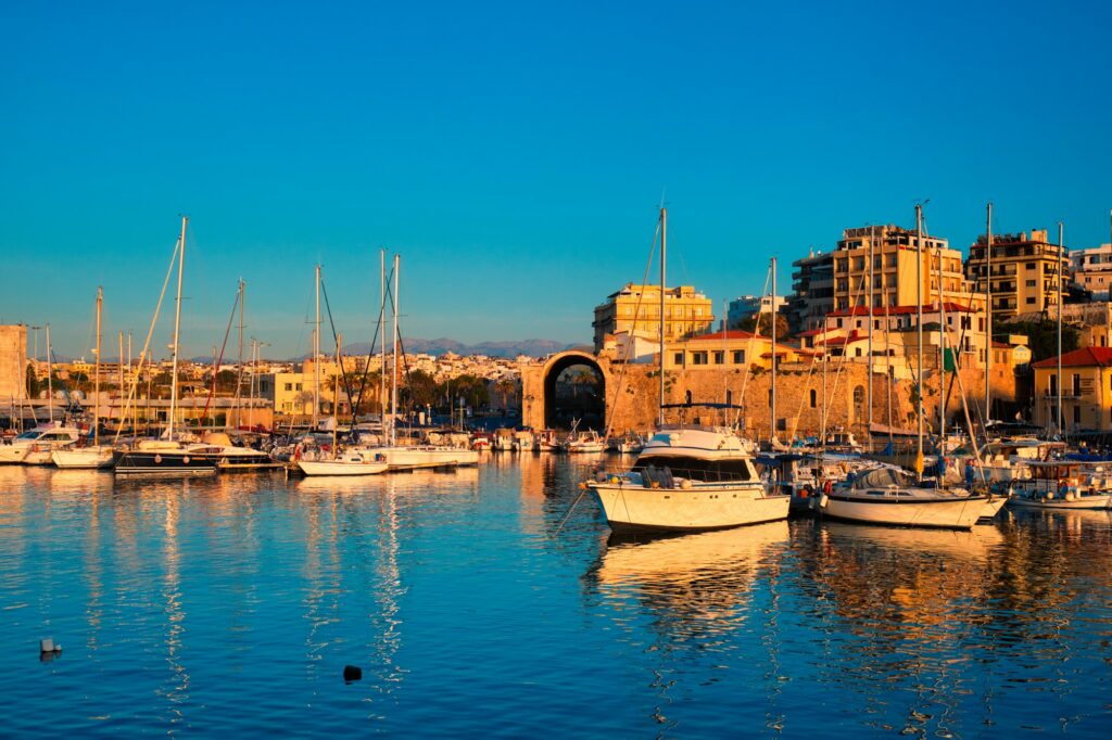 Venetian Fort in Heraklion and moored fishing boats, Crete Island, Greece